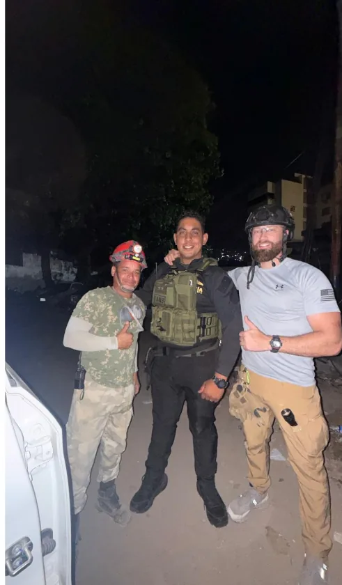 Coordinating with local search and rescue personnel on site at night